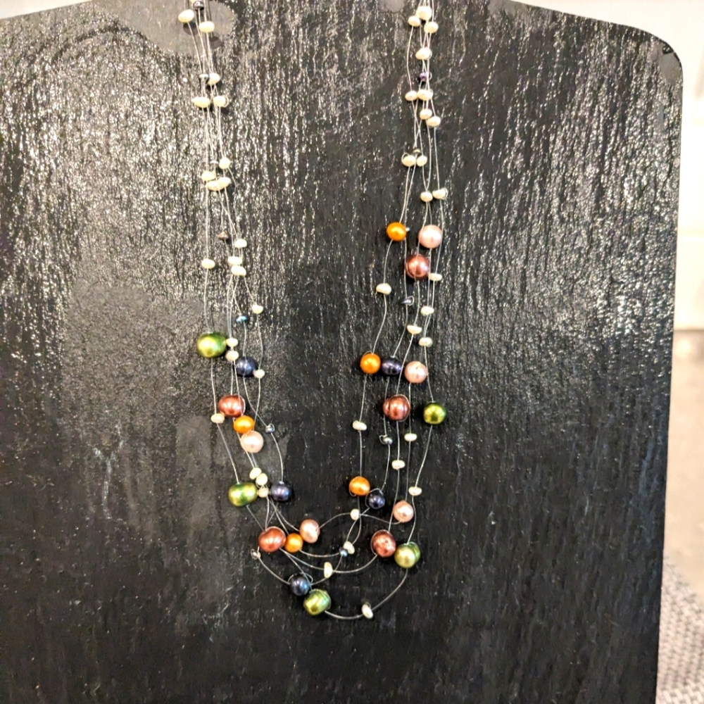 Multi strand Freshwater multi colored necklace. New with pouch